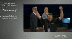 Mark collecting Outsourcery WPC Microsoft Worldwide Award